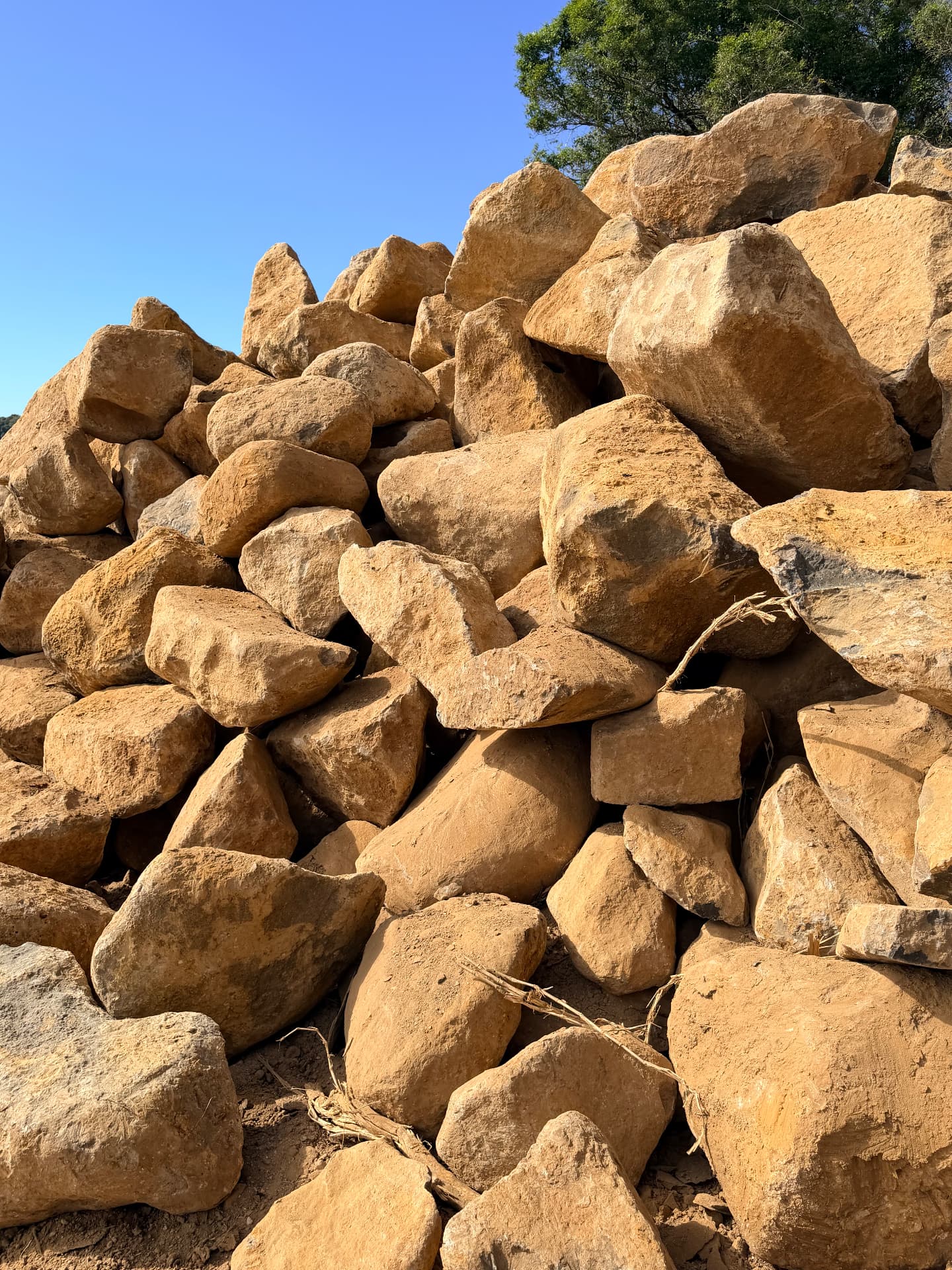 Stockpile of graded rock sorted by size